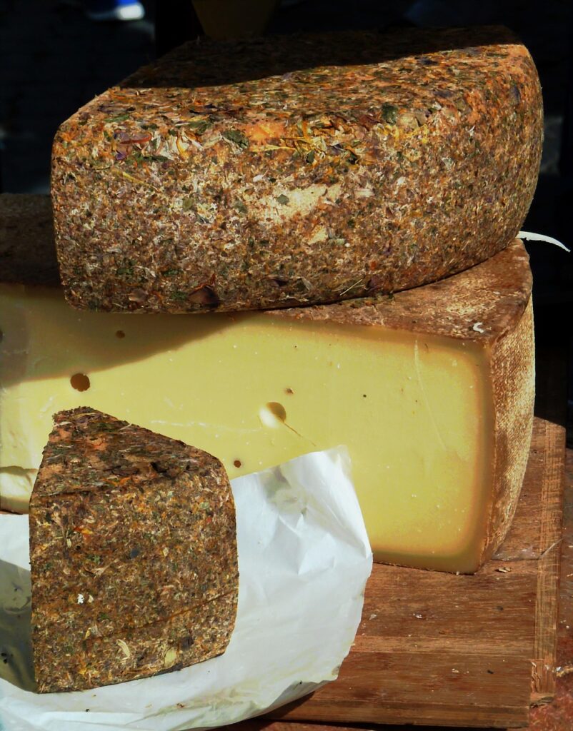 cheese, dairy product, cheese loaf, hard cheese, yummy, meal, market stall, milk, gouda cheese, loaf, food, nourishment